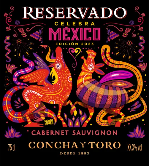 Etiqueta de Cabernet Sauvignon Reservado Celebra México: dos criaturas tipo alebrije en rojo, naranja y morado sobre fondo negro.